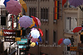 Parapluies colorant une rue de Lausanne en fête - SUISSE