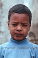 Portrait d'un garçon ayant des mouches sur le visage - EGYPTE