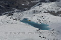Point d'eau dans le glacier Gorner survolé par un helicoptère - SUISSE